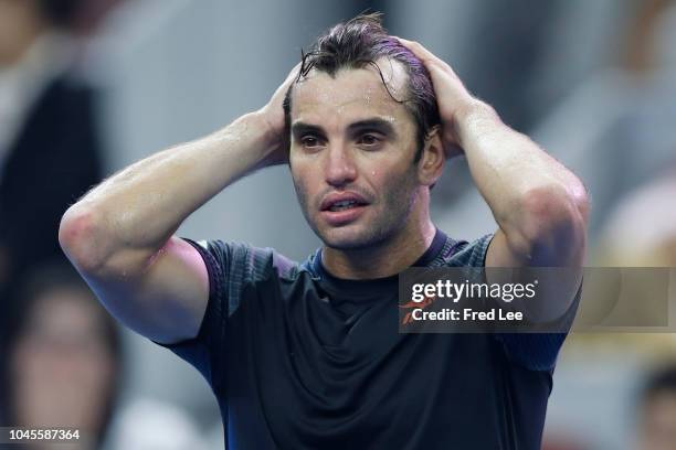 Malek Jaziri of Tunisia celebrates after winning against Alexander Zverev of Germany during their Men's Singles 3rd Round match of the 2018 China...