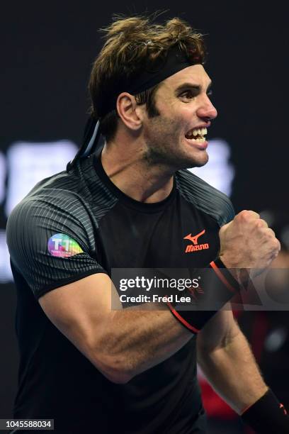 Malek Jaziri of Tunisia celebrates after winning against Alexander Zverev of Germany during their Men's Singles 2nd Round match of the 2018 China...