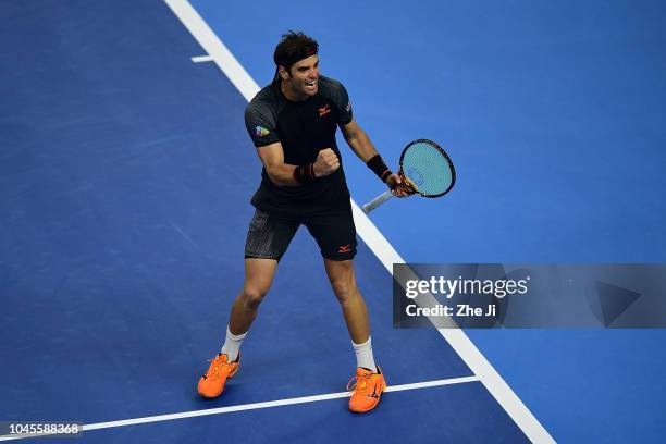 Malek Jaziri of Tunisia celebrates after winning against Alexander Zverev of Germany during their Men's Singles 2nd Round match of the 2018 China...