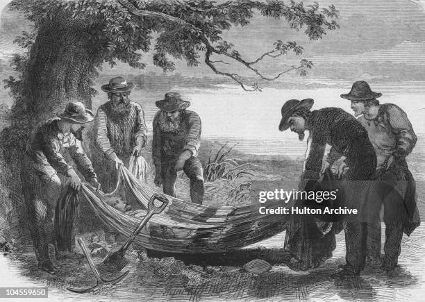 The burial of explorer Robert O'Hara Burke at Cooper Creek in South Australia, by Alfred William Howitt's party, 1861. Burke and William John Wills...