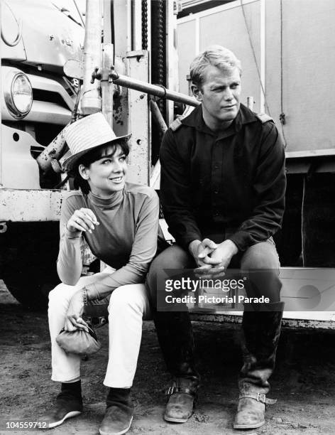 American actors Troy Donahue and Suzanne Pleshette, co-stars of film 'A distant trumpet' relax on set, Arizona, circa 1964.