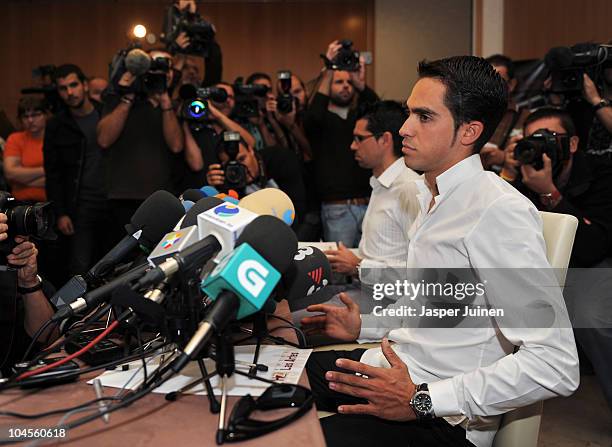 Alberto Contador is surrounded by media at the start of his press conference where he pleaded his innocence after being tested positive for...