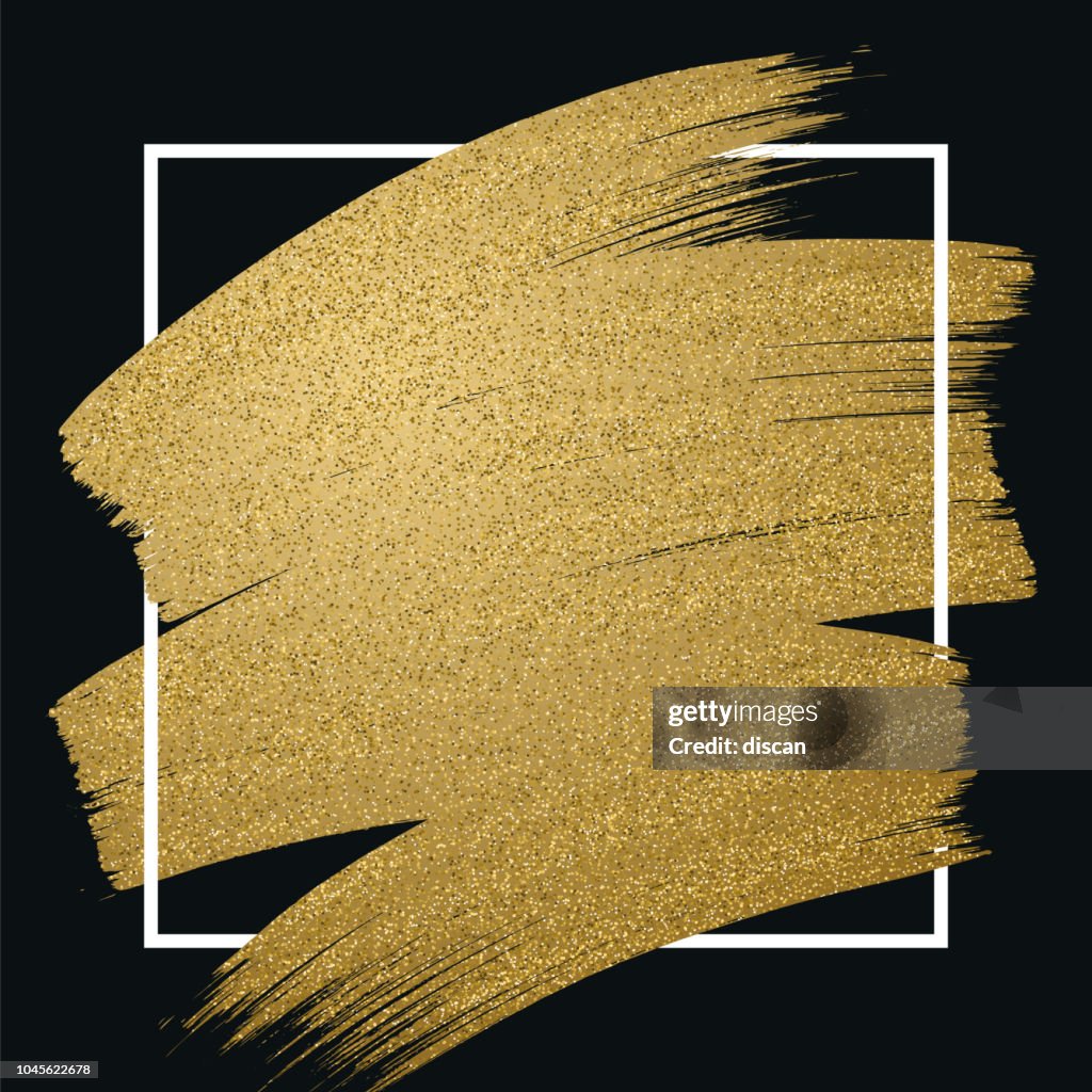 Glitter golden brush stroke with frame on black background