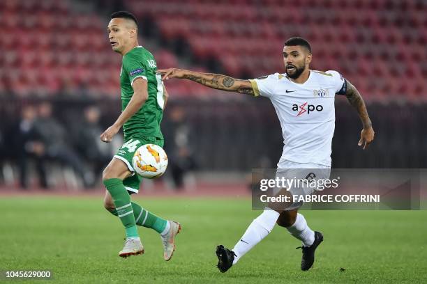 Ludogorets' Bulgarian midfielder Marcelinho and FC Zurich's Icelandic midfielder Victor Palsson vie for the ball during the UEFA Europa League group...