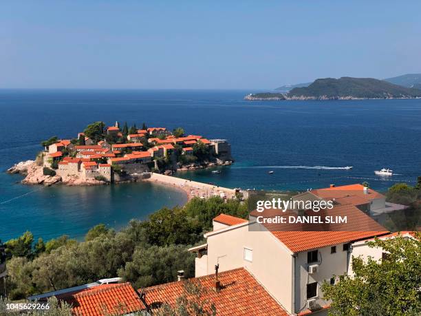 General view of Sveti Stefan, one of the most scenic town and beach in Montenegro, taken on September 15, 2018.