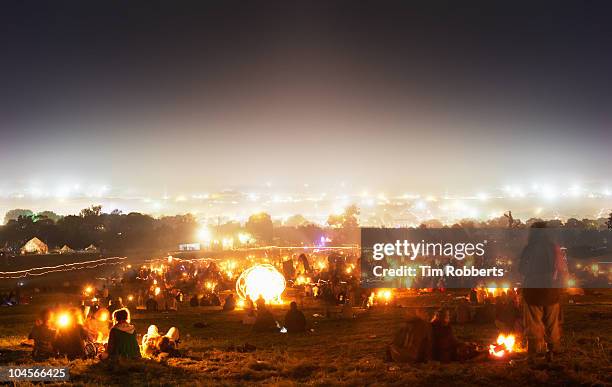 view from the stone circle at glastonbury festival - glastonbury england stock pictures, royalty-free photos & images