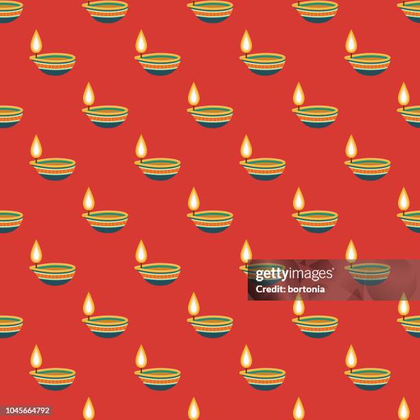 diwali candle india seamless pattern - indian pattern stock illustrations