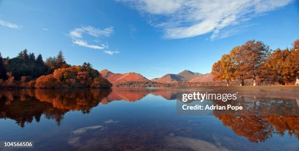 view over derwentwater in autumn - derwent water stock-fotos und bilder