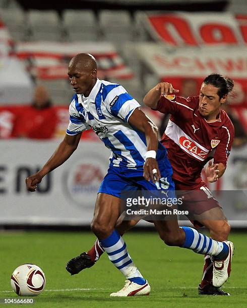 Kalilou Traore of Odense and Mauro Germain Camonaresi of Stuttgart compete for the ball during the UEFA Europa League group H match between Odense...