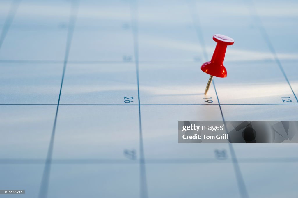 Thumb tack on calendar