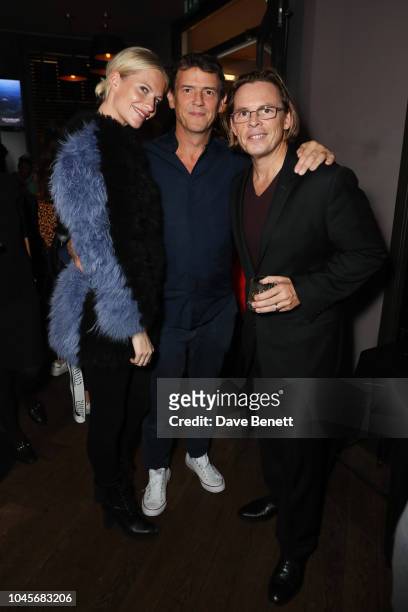 Poppy Delevingne, Marcus Langlands Pearse and Mark Hehir attend the relaunch of the legendary Maldives resort, Huvafen Fushi, at The Piano Bar, Soho,...