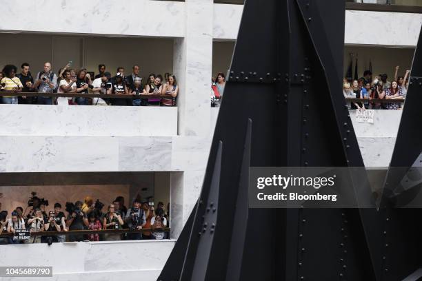 Protesters opposed to Supreme Court nominee Brett Kavanaugh gather in the Hart Senate Office building in Washington, D.C., U.S., on Thursday, Oct. 4,...