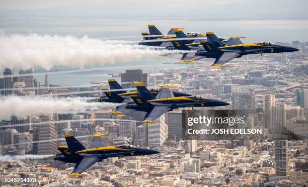 The US Navy Blue Angels fly over San Francisco, California as part of a practice run for Fleet Week on October 04, 2018.