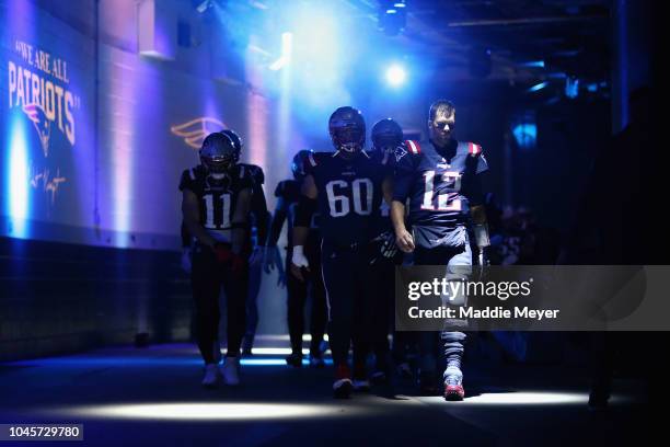 Tom Brady of the New England Patriots walks through the tunnel before the game against the Indianapolis Colts at Gillette Stadium on October 4, 2018...