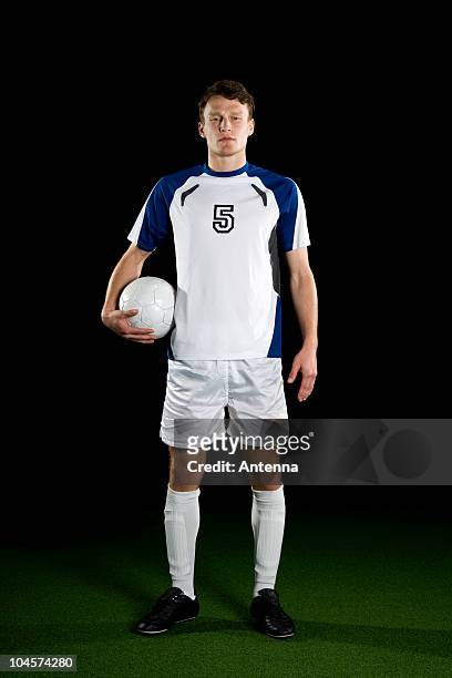 a soccer player, portrait, studio shot - camisola de futebol imagens e fotografias de stock