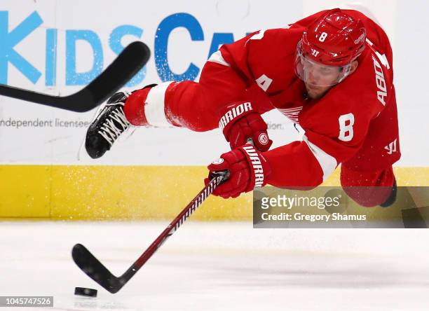 Justin Abdelkader of the Detroit Red Wings tries to control the puck while playing the Columbus Blue Jackets during the second period at Little...