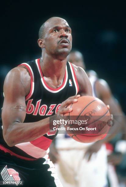 Terry Porter of the Portland Trail Blazers shoots a free throw against the Washington Bullets during an NBA basketball game circa 1991 at the Capital...