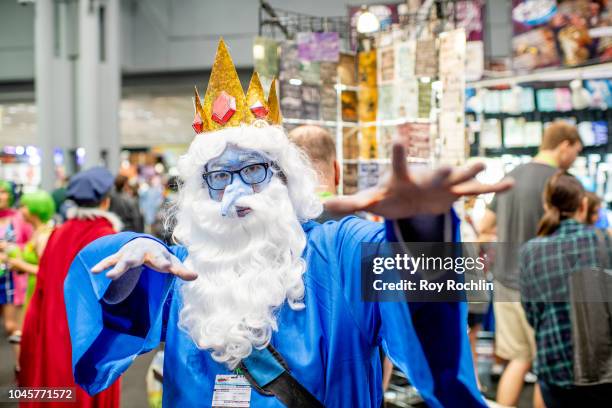 Fan cosplays as Ice King from Adventure Time during the 2018 New York Comic Con at Javits Center on October 4, 2018 in New York City.