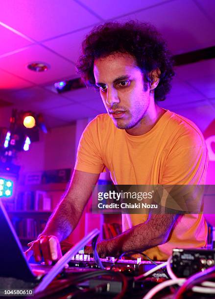 Four Tet performs at launch of nationwide music festival 'Oxjam' at Dalston Oxfam Shop on September 30, 2010 in London, England.