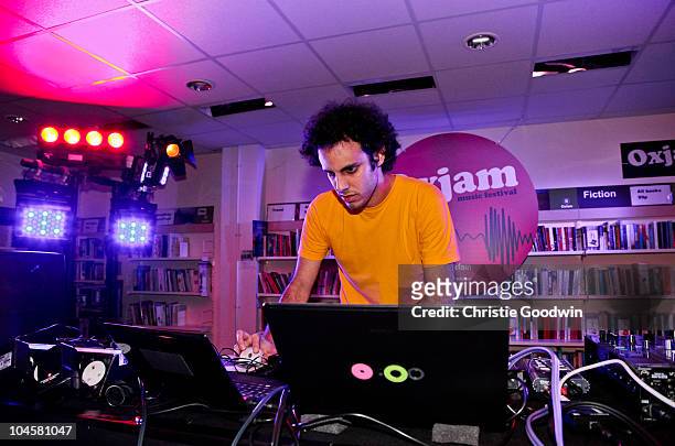 Four Tet performs in the Oxfam shop in Dalston as part of Oxjam Music Festival at The Roundhouse on September 30, 2010 in London, England.