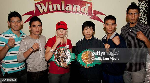 Boxers Jonathan Coronado, Juan Jose Montes, Irma Sanchez, Naomi Togashi, Silvester Lopez and Daniel Sandoval pose for a photograph during a press...