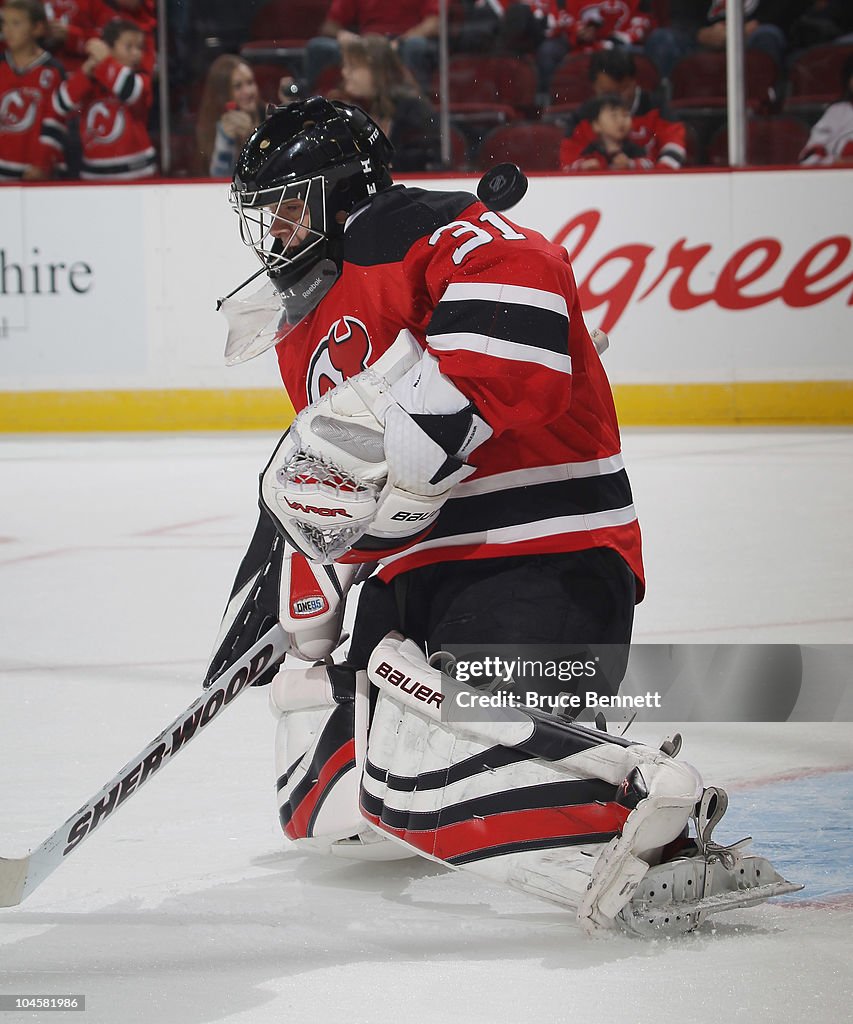 Jeff Frazee of the New Jersey Devils tends net in warmups prior to