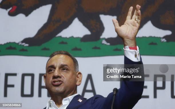 Congressional candidate Gil Cisneros speaks at a 2018 mid-term elections rally on October 4, 2018 in Fullerton, California. The event, at California...