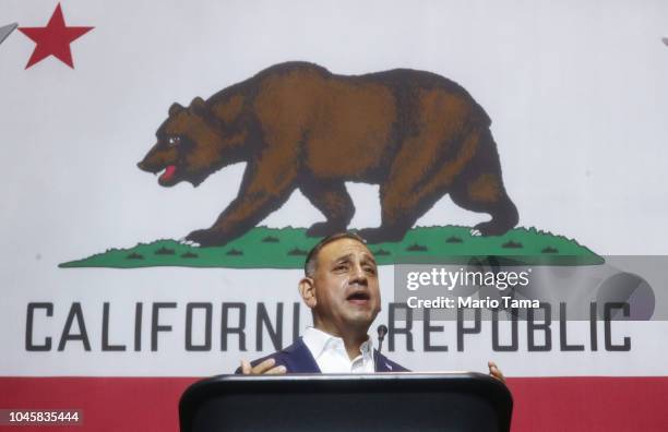 Democratic congressional candidate Gil Cisneros speaks at a 2018 mid-term elections rally on October 4, 2018 in Fullerton, California. The event, at...