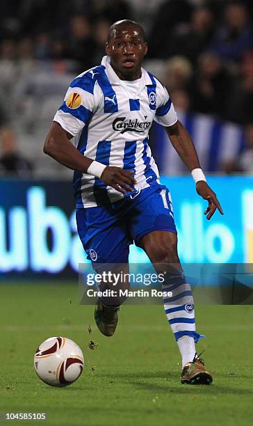 Eric Djemba Djemba of Odense runs with the ball during the UEFA Europa League group H match between Odense Boldklub and VfB Stuttgart at Odense...