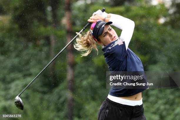 Lexi Thompson of the United States hits a tee shot on the 6th hole in the Pool B match between Japan and USA on day two of the UL International Crown...