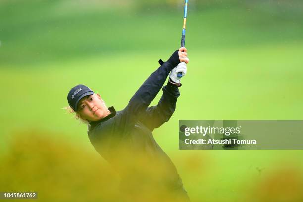 Michelle Wie of the United States hits her second shot on the 6th hole in the Pool B match between Japan and USA on day two of the UL International...