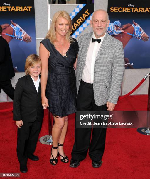 Peta Wilson and John Malkovich attend the 'Secretariat' film premiere at the El Capitan Theatre on September 30, 2010 in Hollywood, California.