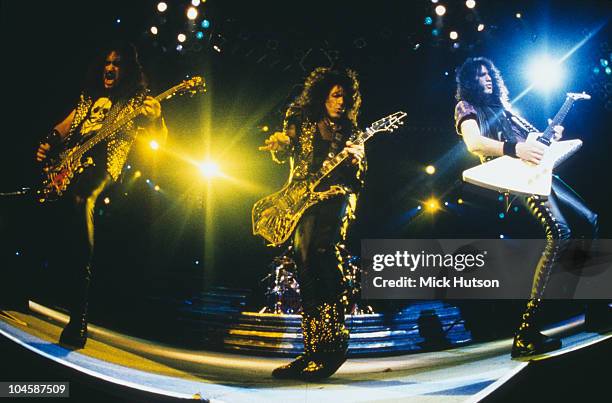 American rock group Kiss performing on stage, circa 1992. Left to right: Gene Simmons, Paul Stanley and Bruce Kulick.