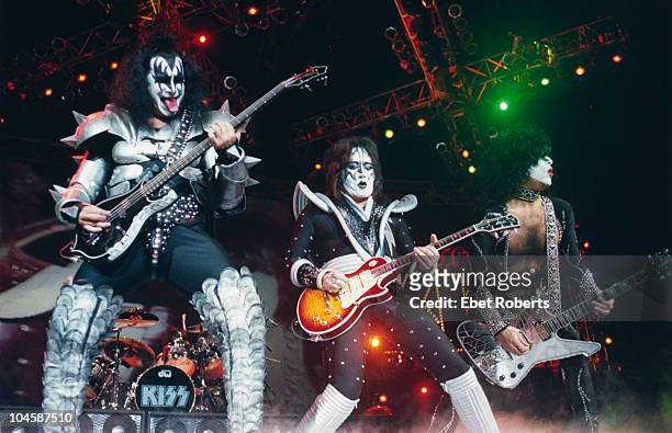American rock group Kiss performing at the Continental Airlines Arena, New Jersey, circa 1996. Left to right: Gene Simmons, Ace Frehley and Paul...