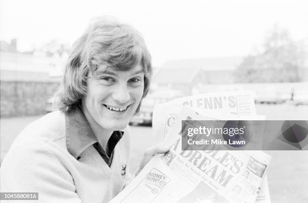 English soccer player Glenn Hoddle of Tottenham Hotspur FC holding newspapers celebrating his outstanding performance with his team, London, UK, 5th...