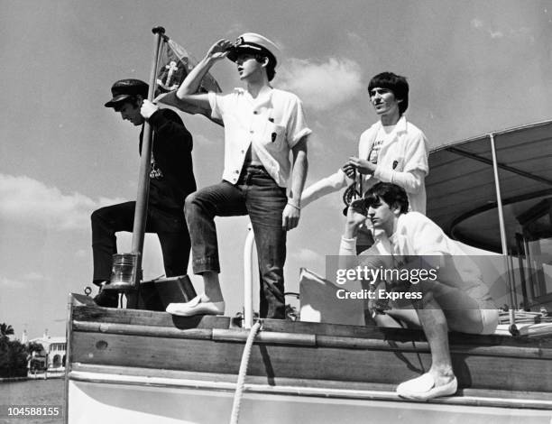 Pop group The Beatles set sail from Miami Beach, Florida. Left to right, John Lennon, Paul McCartney, George Harrison and Ringo Starr, circa February...