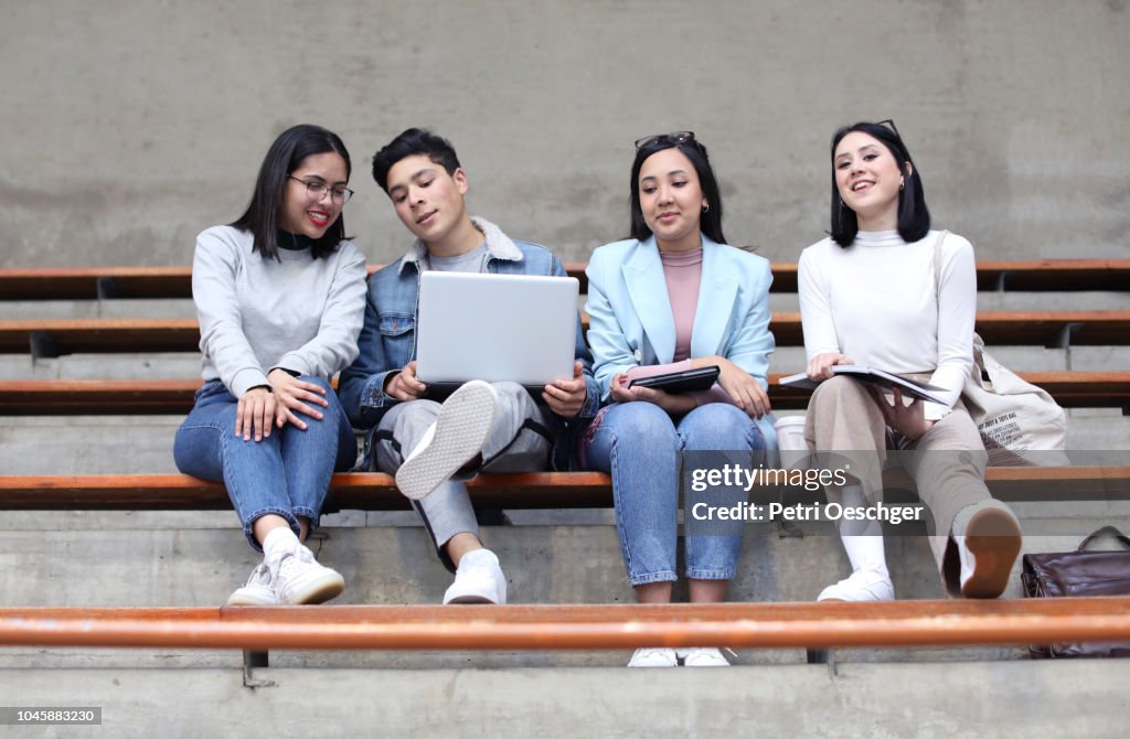 Break Between Class University Students Having A Break Between Classes High-Res Stock Photo ...