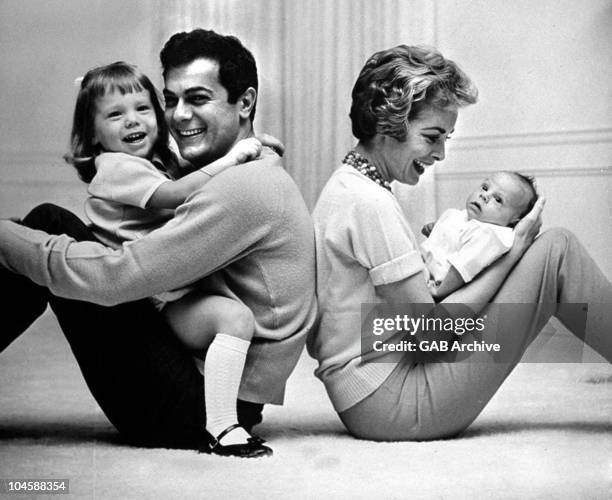 Tony Curtis and Janet Leigh pose with their children Kelly Curtis and Jamie Lee Curtis in 1959 in the United States.