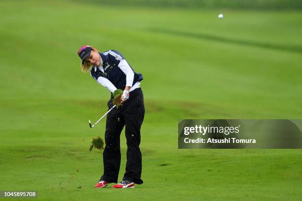 Lexi Thompson of the United States hits her second shot on the 7th hole in the Pool B match between Japan and USA on day two of the UL International...