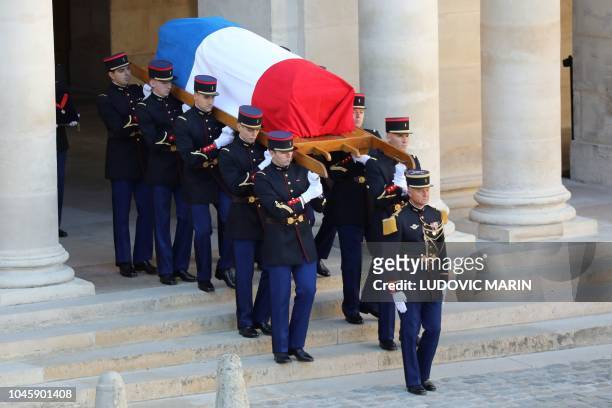 French Republican guards carry the coffin of French-Armenian singer-songwriter Charles Aznavour during the national homage at the Invalides in Paris...