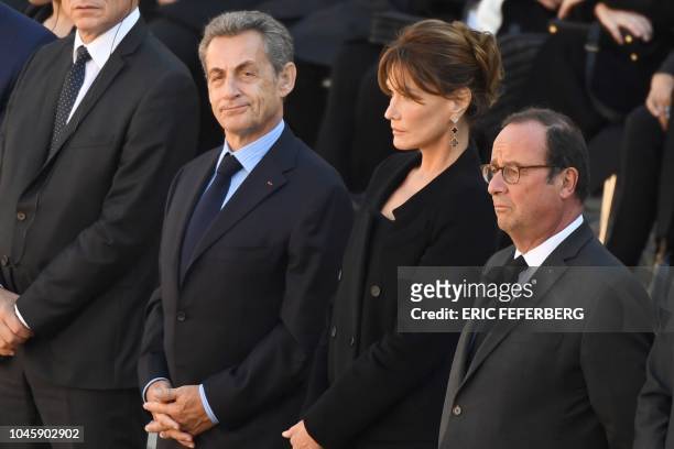 Former French President Nicolas Sarkozy and his wife Carla Bruni and French President Francois Hollande attend the national homage to French-Armenian...
