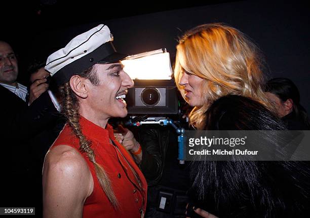 John Galliano and Kate Moss attend the Christian Dior Ready to Wear Spring/Summer 2011 show during Paris Fashion Week at Espace Ephemere Tuileries on...