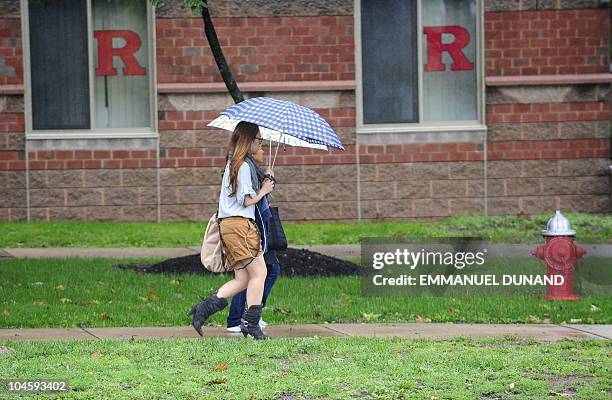 Student walks past the dormitory at Rutgers Univeristy in New Brunswick, New Jersey on October 01, 2010 where first-year student Tyler Clementi lived...