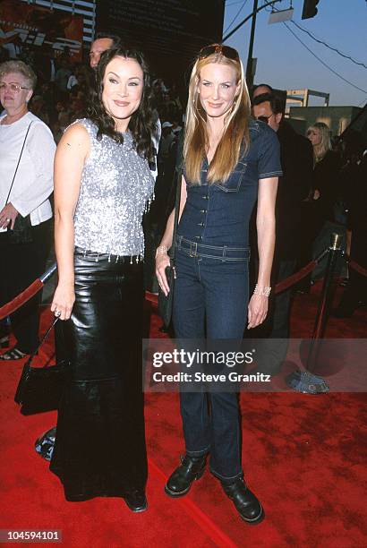 Jennifer Tilly & Daryl Hannah during "Mission: Impossible 2" Los Angeles Premiere at Mann Chinese Theatre in Hollywood, California, United States.