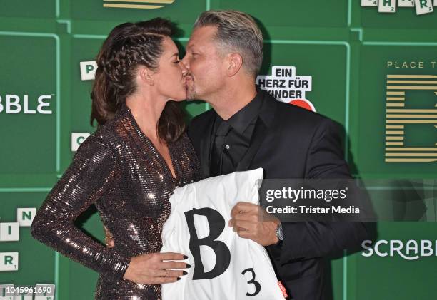 Alice Krueger and her husband Hardy Krueger Jr. Attend the charity event PLACE TO B Playing for Charity at Restaurant GRACE on October 4, 2018 in...