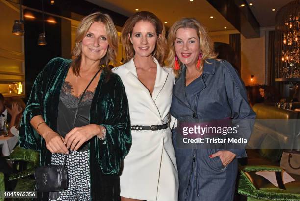 Mareile Hoeppner, Alexa Maria Surholt and Kim Fisher attend the charity event PLACE TO B Playing for Charity at Restaurant GRACE on October 4, 2018...