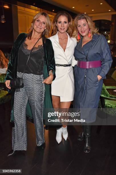 Mareile Hoeppner, Alexa Maria Surholt and Kim Fisher attend the charity event PLACE TO B Playing for Charity at Restaurant GRACE on October 4, 2018...