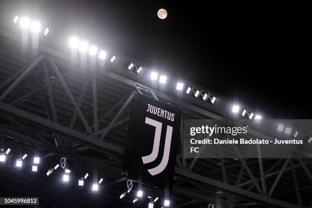 The moon is seen above Juventus logo during the serie A match between Juventus and Bologna FC on September 26, 2018 in Turin, Italy.