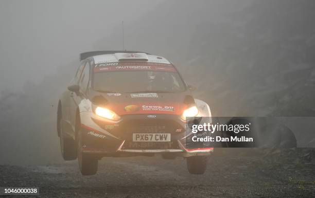 Gus Greensmith of Great Britain and Gus Greensmith drives with co-driver Alex Gelsomino of the United States during the Slate Mountain Stage on day...