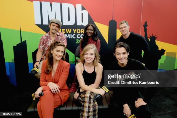 Brenton Thwaites, Anna Diop, Alan Ritchson, Minka Kelly, Teagan Croft , and Ryan Potter of 'Titans' attend IMDb at New York Comic Con - Day 1 at...